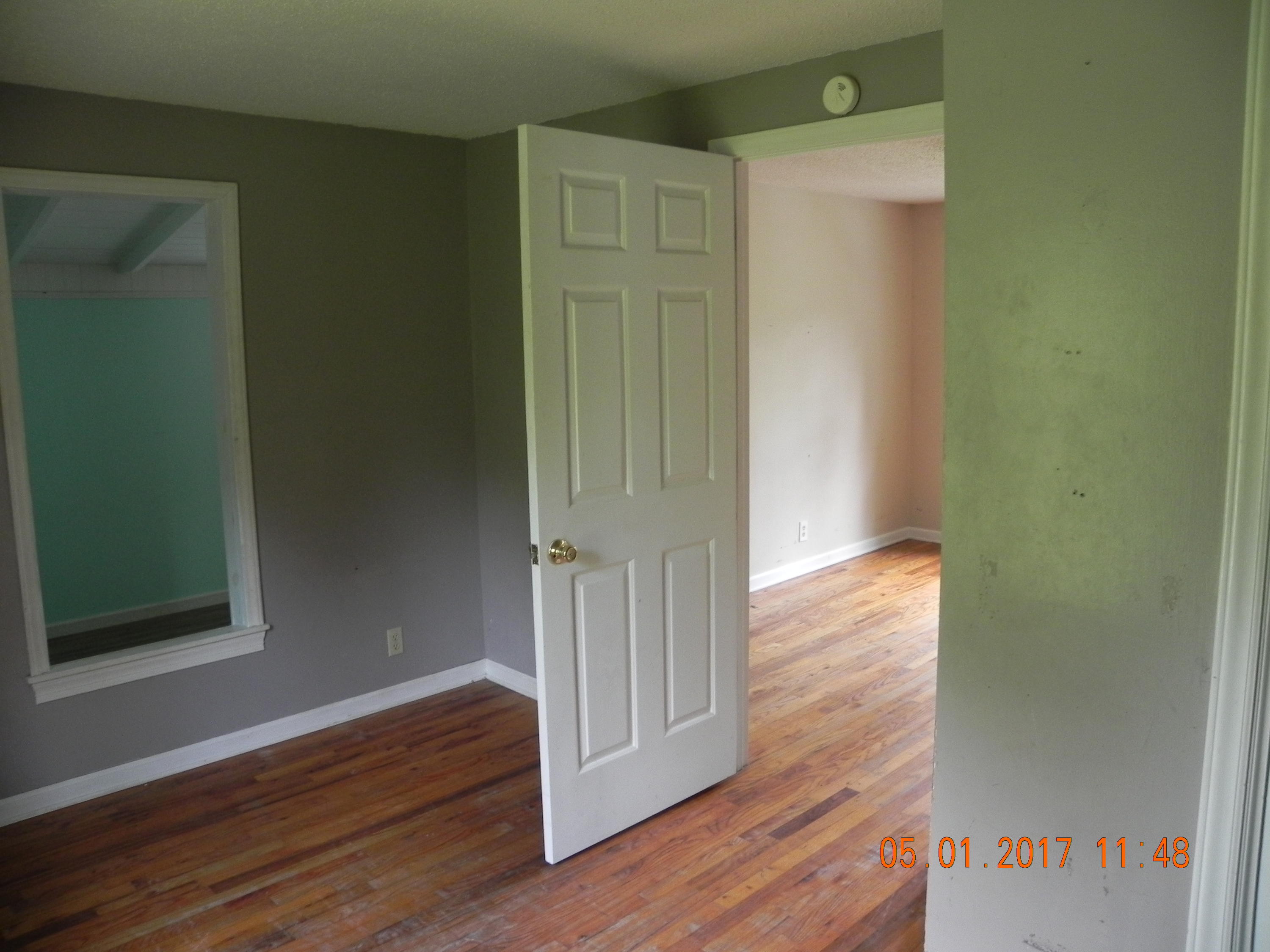 684-656 Peace Road Carthage, NC 28327 - Photo 39 of 41 684 Bedroom #2, window opens to extra room, white doors leads to Bedroom #1.