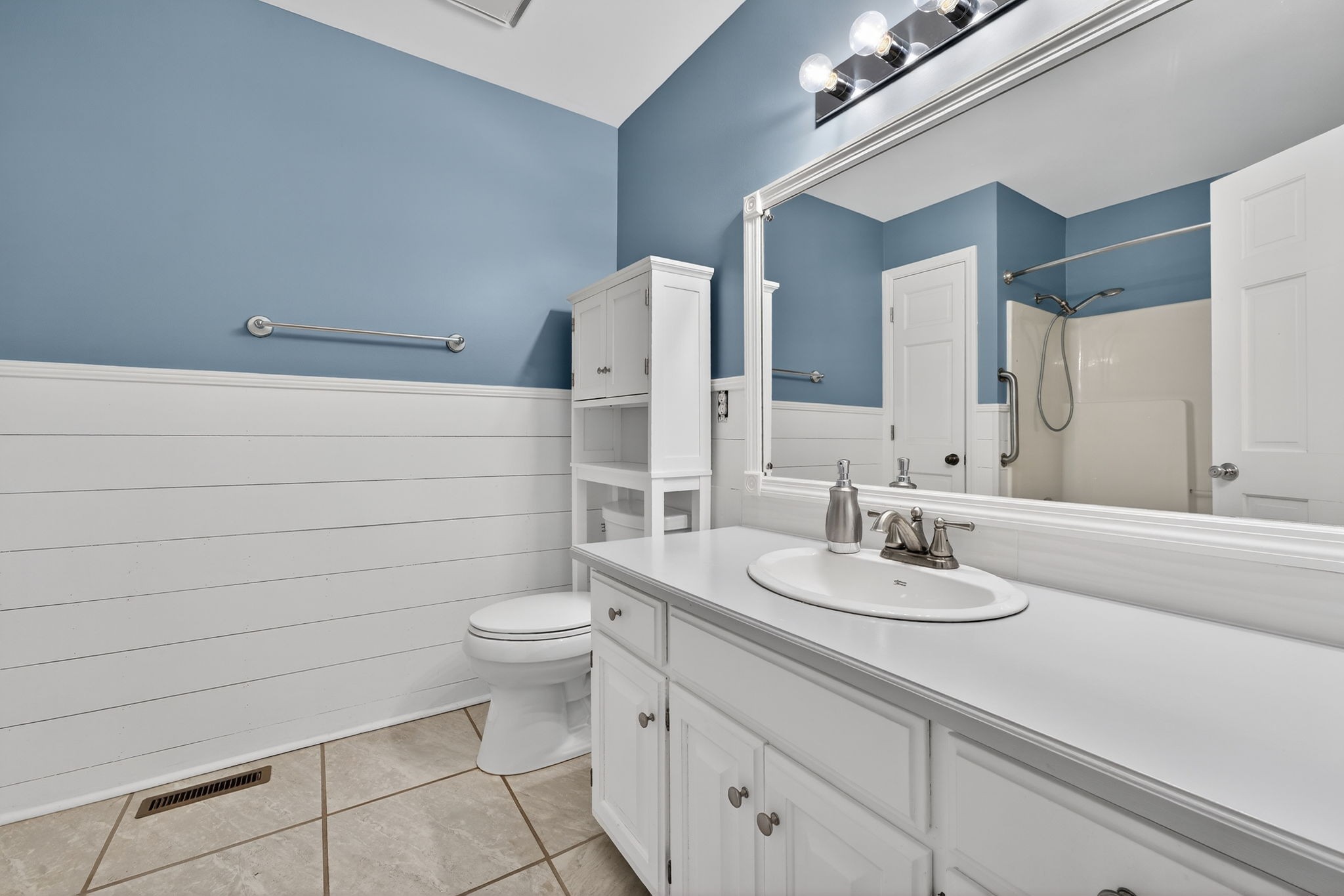 4377 Windrow Road Rockvale, TN 37153 - Photo 13 of 22 a bathroom with a toilet sink and mirror