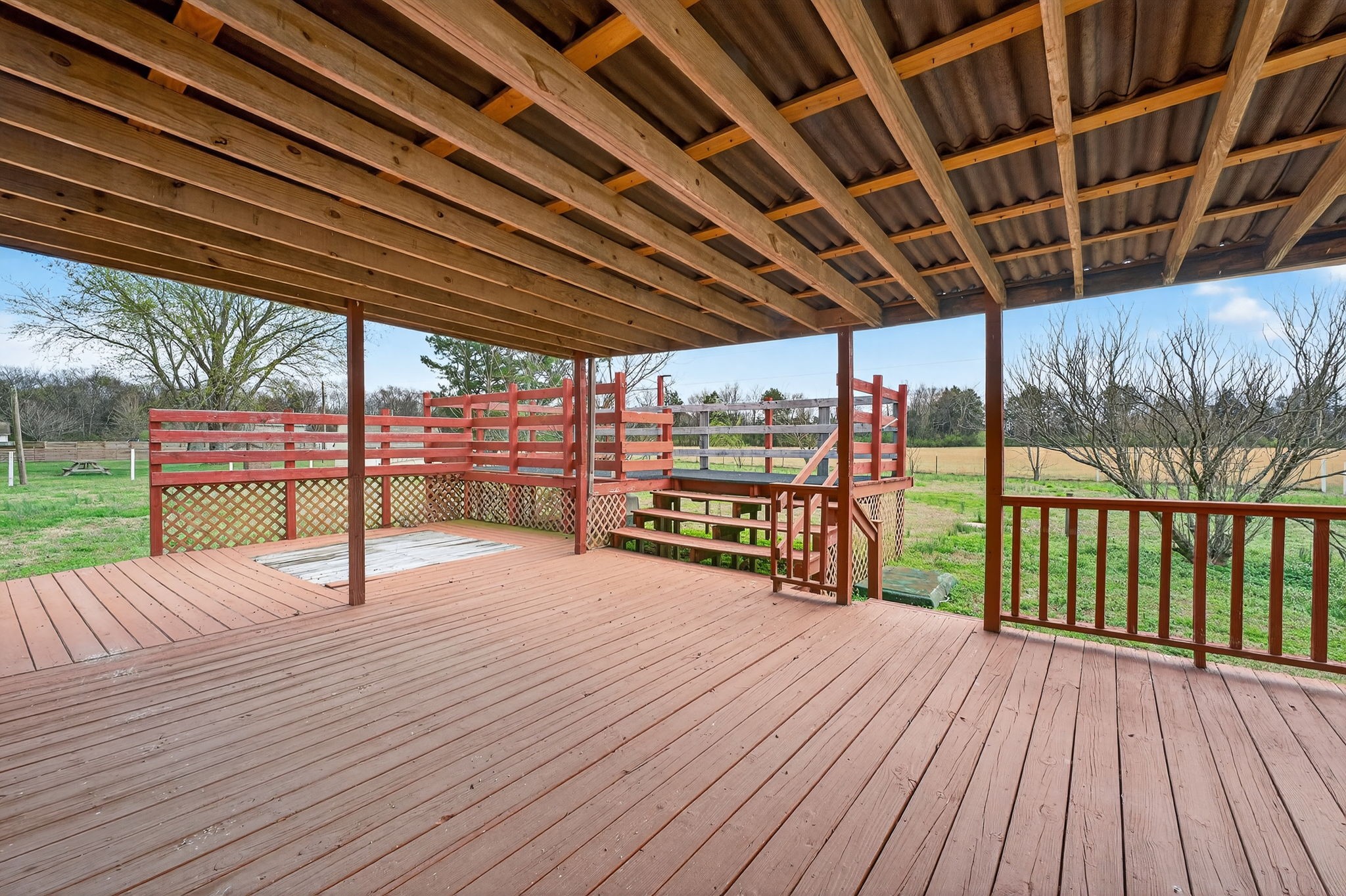 4377 Windrow Road Rockvale, TN 37153 - Photo 15 of 22 a view of a patio with wooden floor