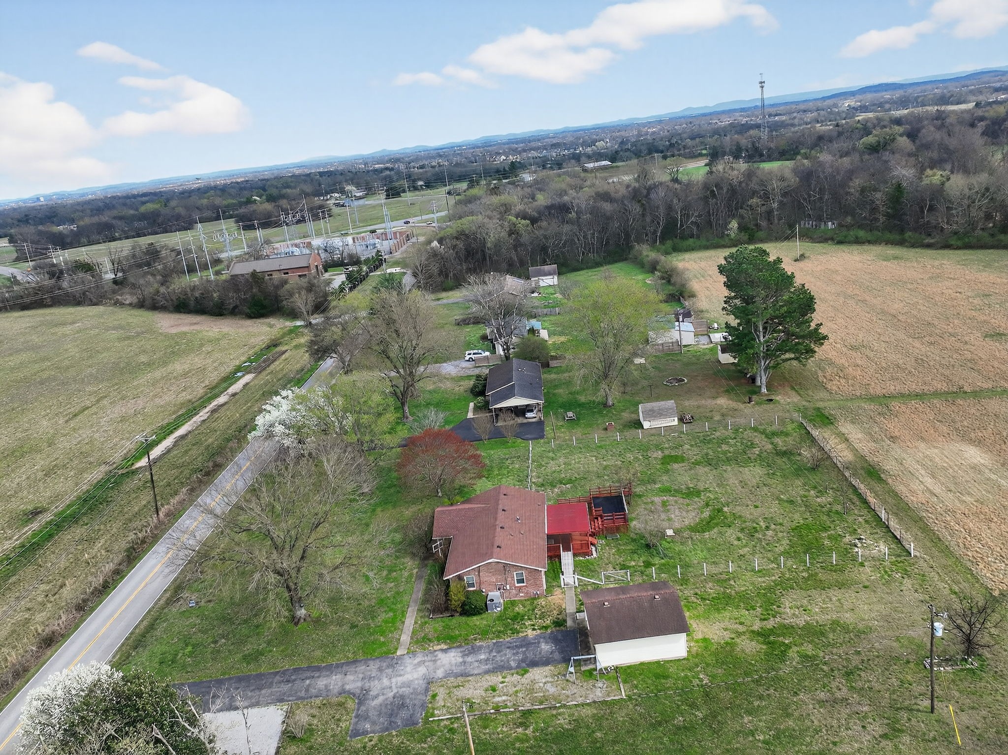 4377 Windrow Road Rockvale, TN 37153 - Photo 18 of 22 an aerial view of residential houses with outdoor space and river