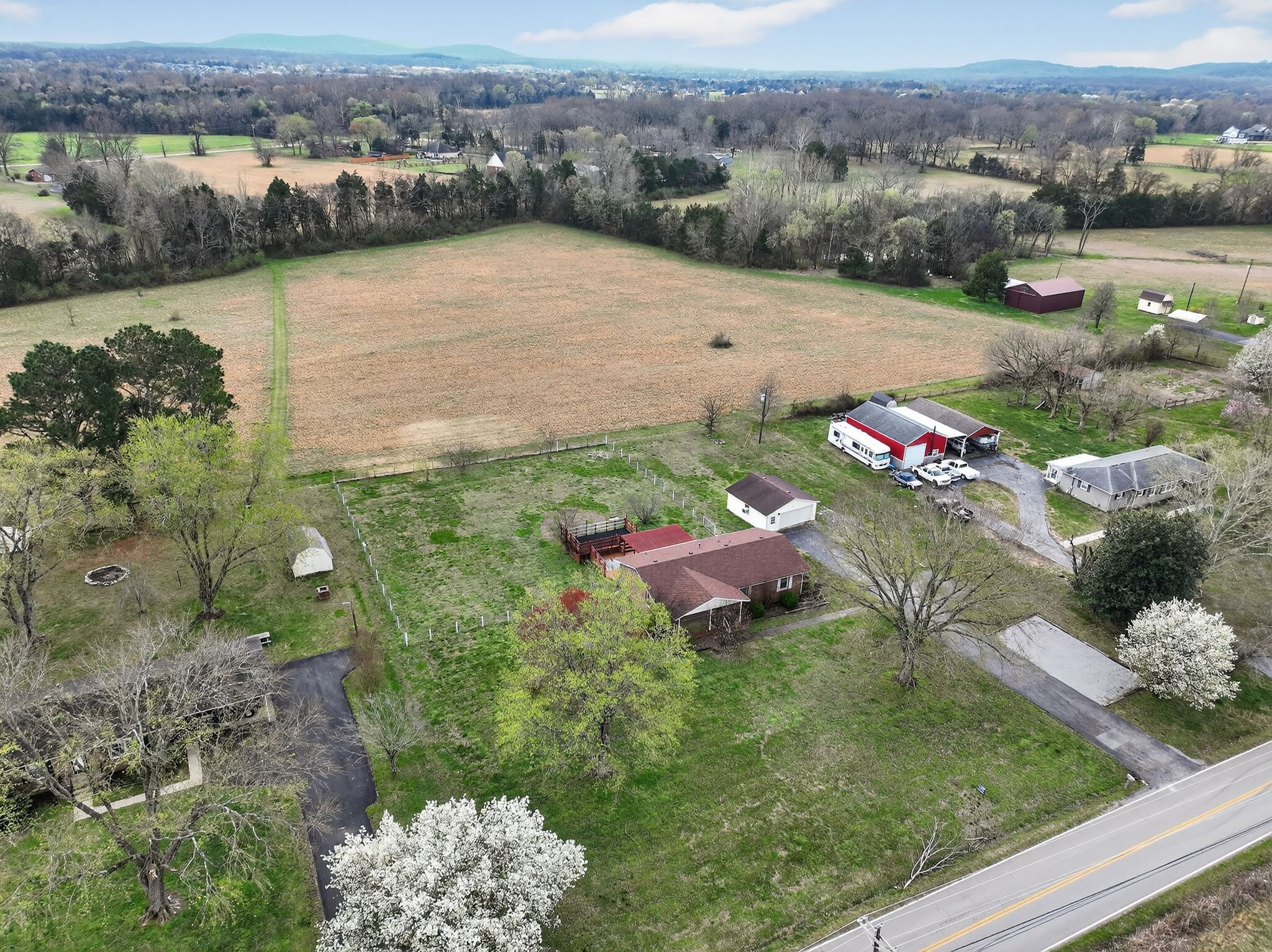 4377 Windrow Road Rockvale, TN 37153 - Photo 19 of 22 a view of a lake with a mountain in the background
