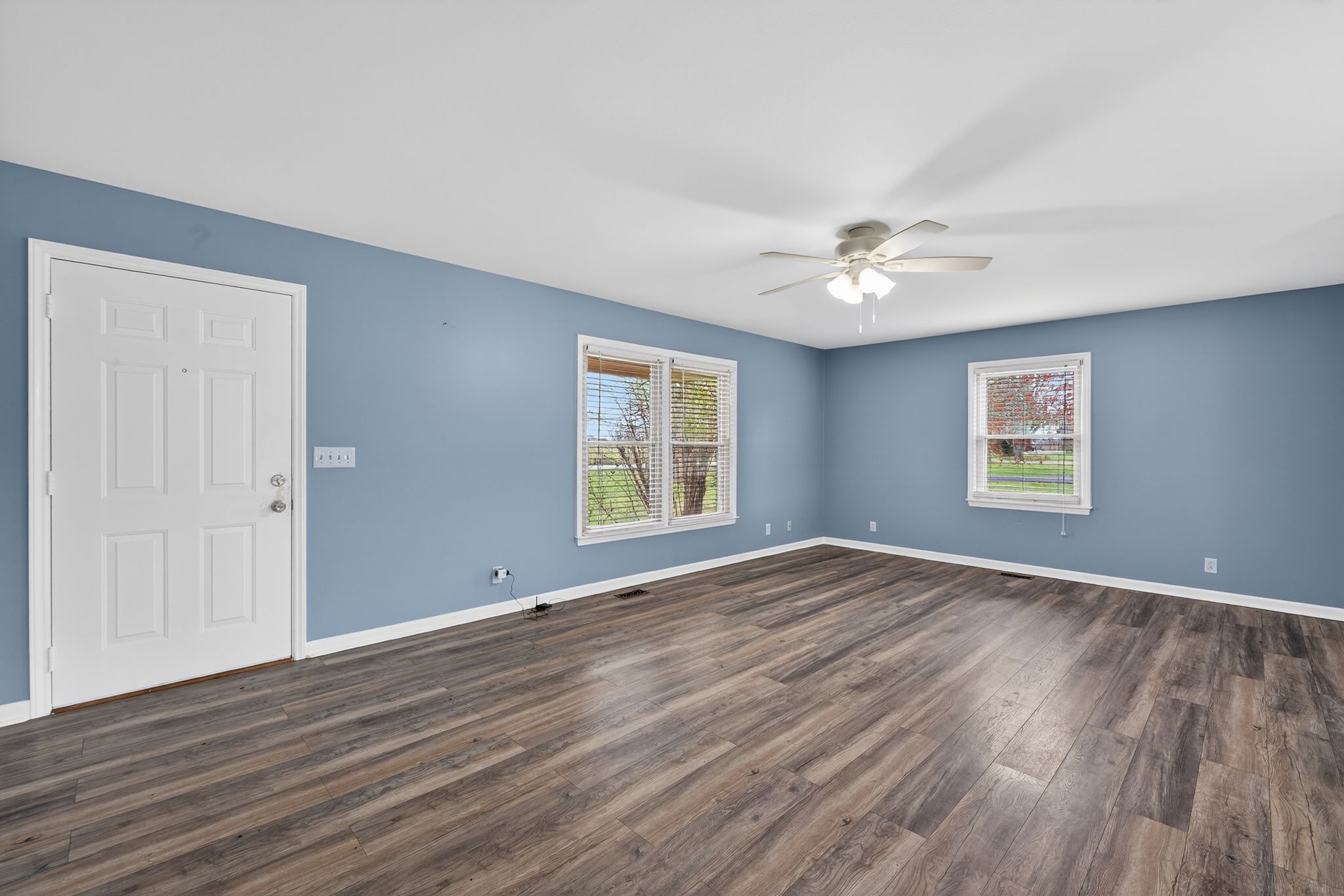 4377 Windrow Road Rockvale, TN 37153 - Photo 10 of 22 a view of an empty room with wooden floor and a window