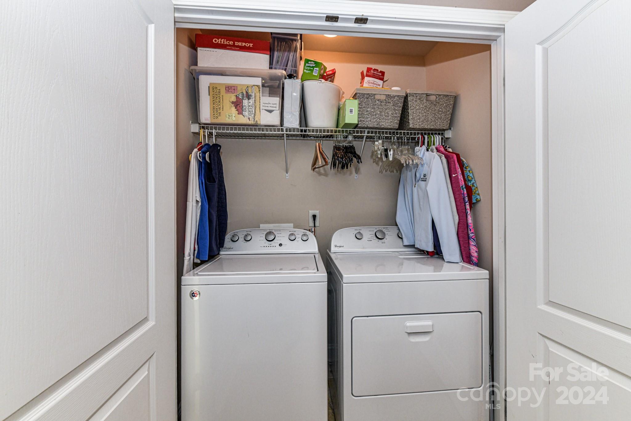 331 Hurston Circle Charlotte, NC 28208 - Photo 18 of 28 a view of storage and utility room with washer and dryer