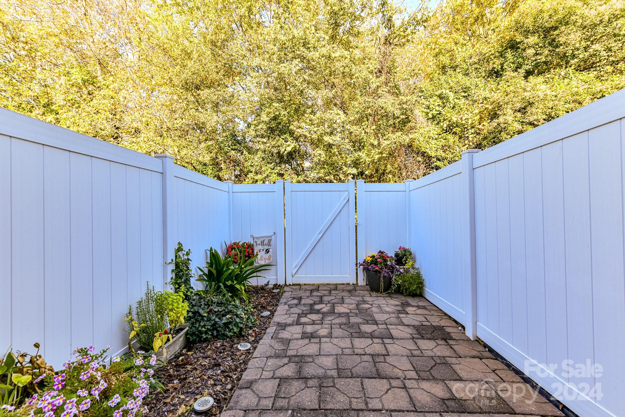 331 Hurston Circle Charlotte, NC 28208 - Photo 9 of 28 a view of a pathway with a flower plants