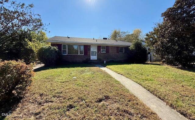 133 Hill Street Roxboro, NC 27573 - Photo 1 of 15 a front view of a house with a yard