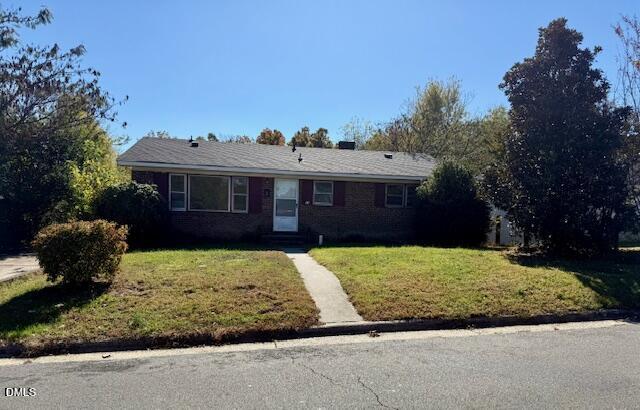 133 Hill Street Roxboro, NC 27573 - Photo 14 of 15 a front view of a house with a yard