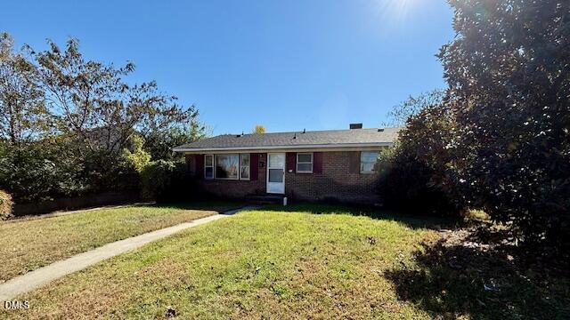 133 Hill Street Roxboro, NC 27573 - Photo 2 of 15 a view of a house with a yard
