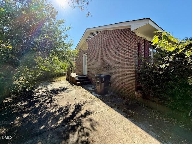 133 Hill Street Roxboro, NC 27573 - Photo 3 of 15 a backyard of a house