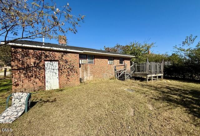 133 Hill Street Roxboro, NC 27573 - Photo 5 of 15 a house view with a backyard space
