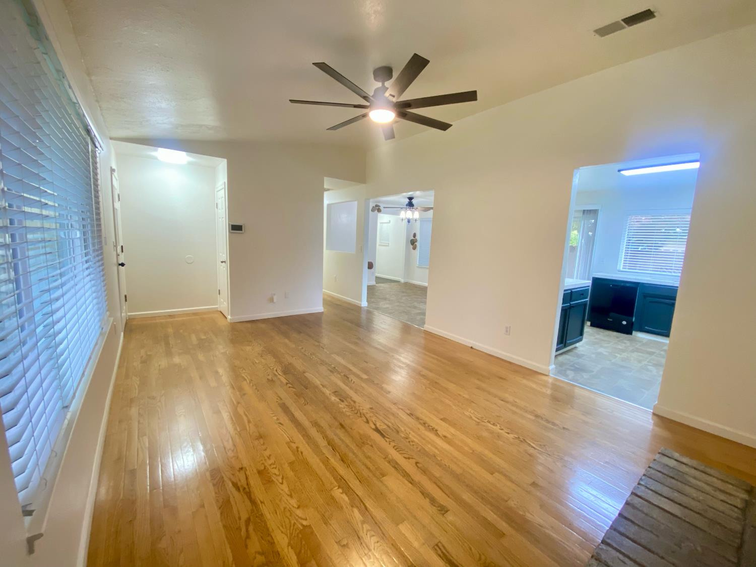 2301 McRitchie Way Modesto, CA 95355 - Photo 11 of 22 a view of empty room with wooden floor