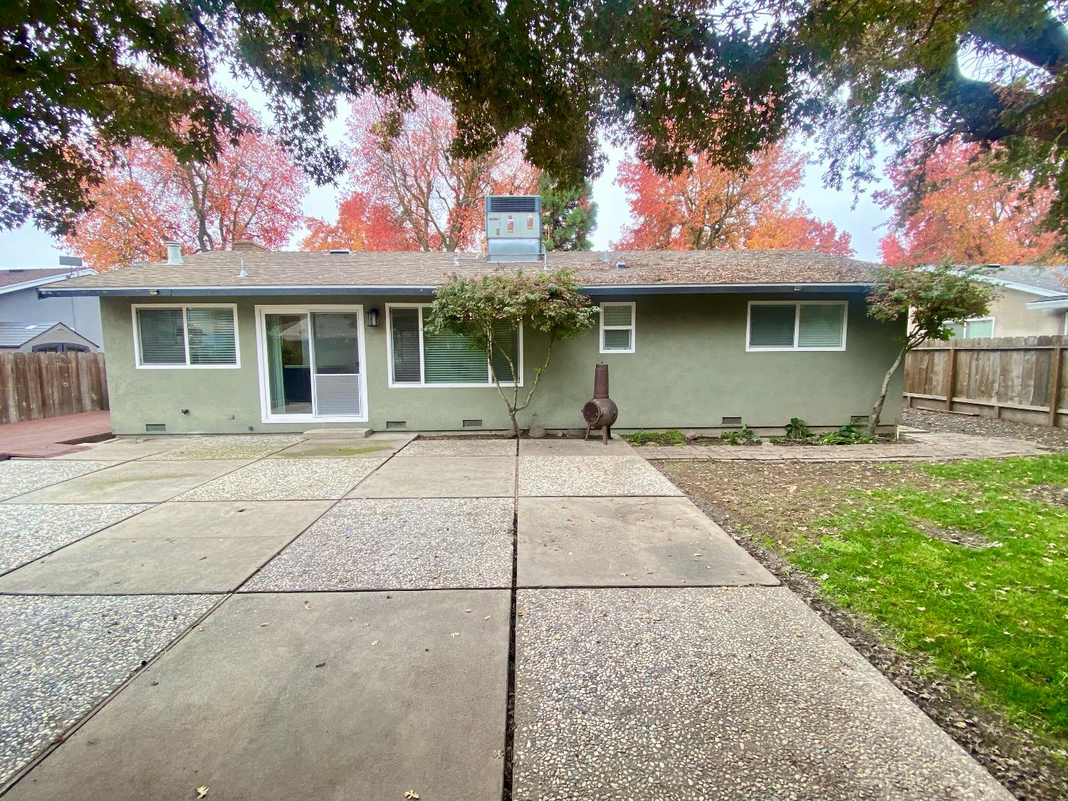 2301 McRitchie Way Modesto, CA 95355 - Photo 16 of 22 a front view of a house with a garden