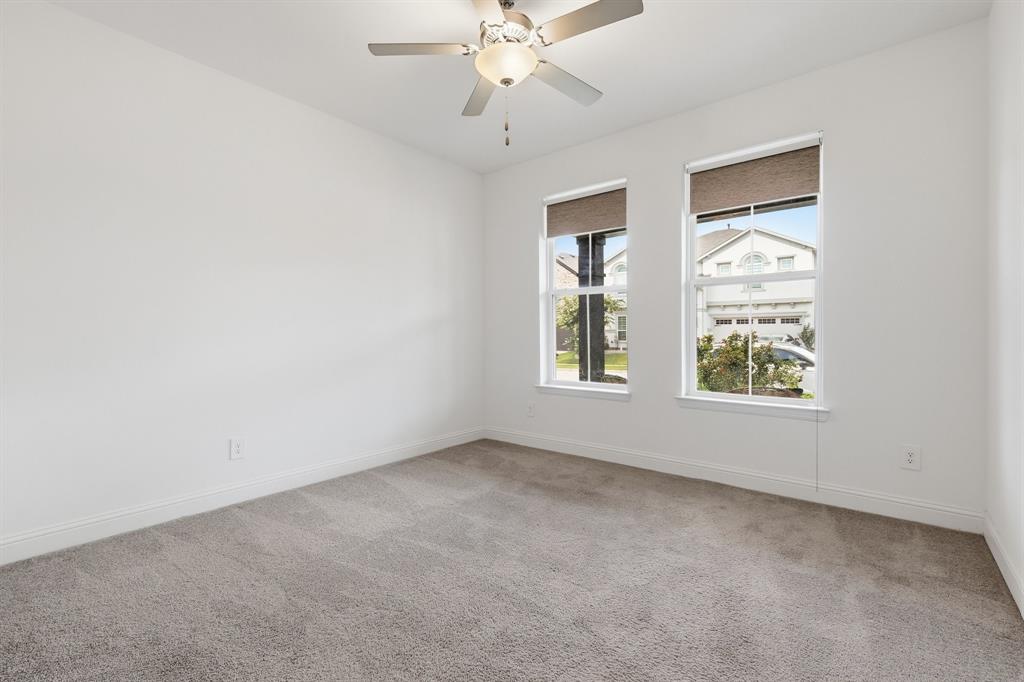 539 Farrell Lane Allen, TX 75013 - Photo 24 of 39 Spacious room featuring neutral carpeting, white walls, and two windows with roller shades
