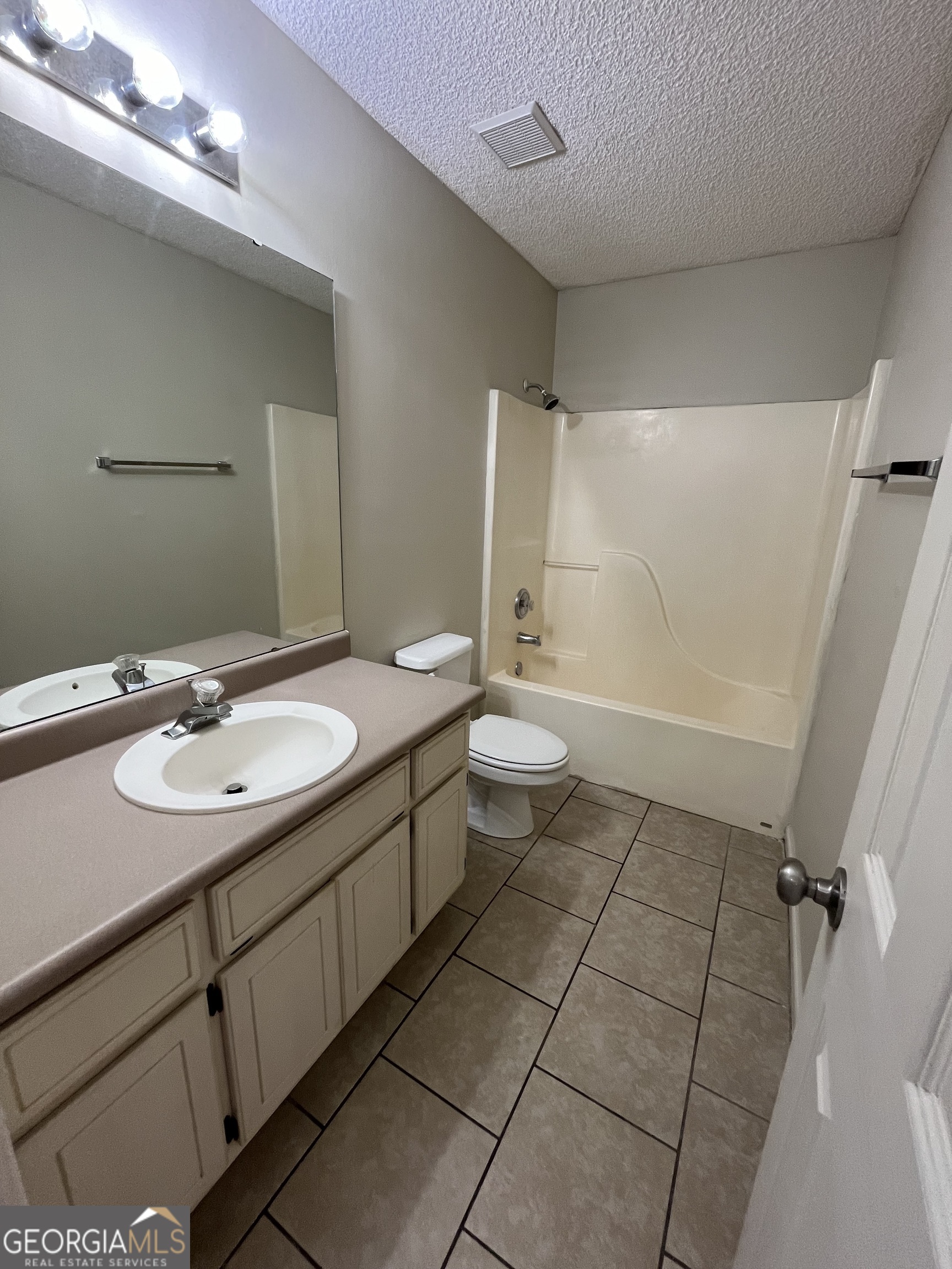 15 Talbot Court St. Marys, GA 31558 - Photo 5 of 20 a bathroom with a sink a toilet and shower