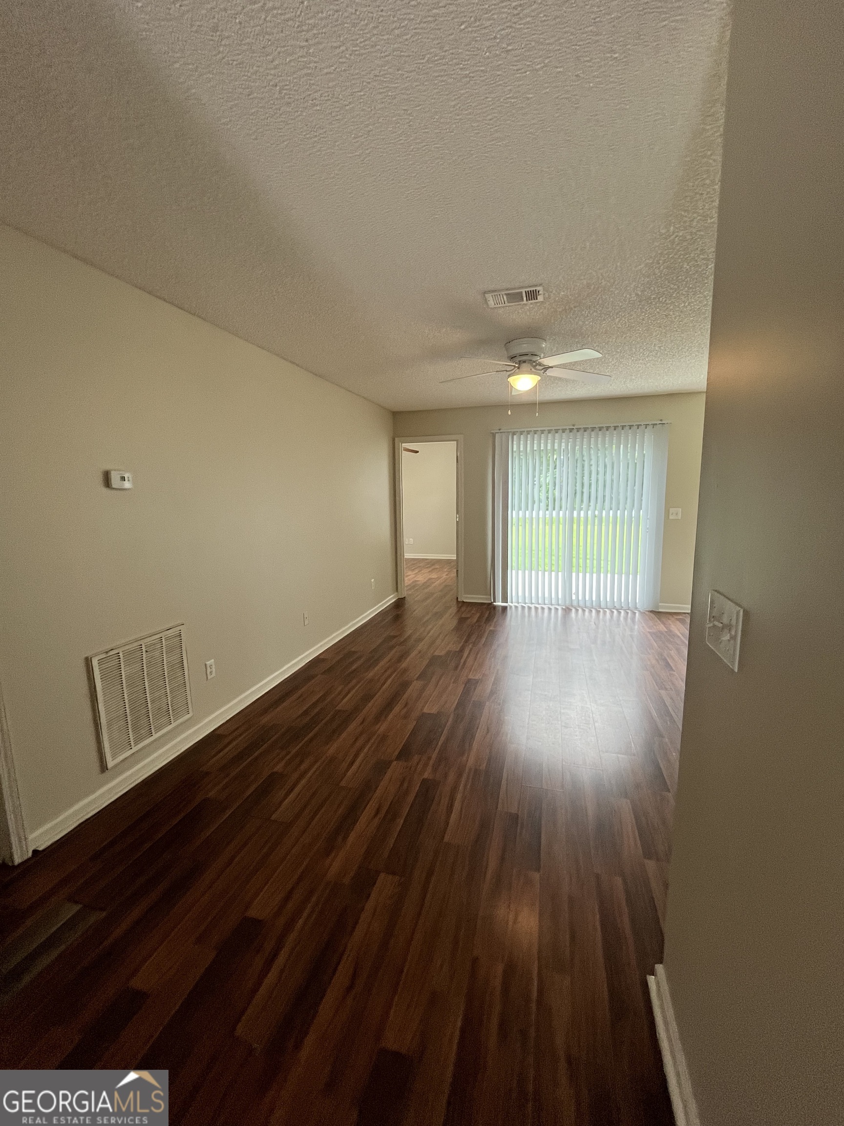 15 Talbot Court St. Marys, GA 31558 - Photo 8 of 20 a view of an empty room and wooden floor