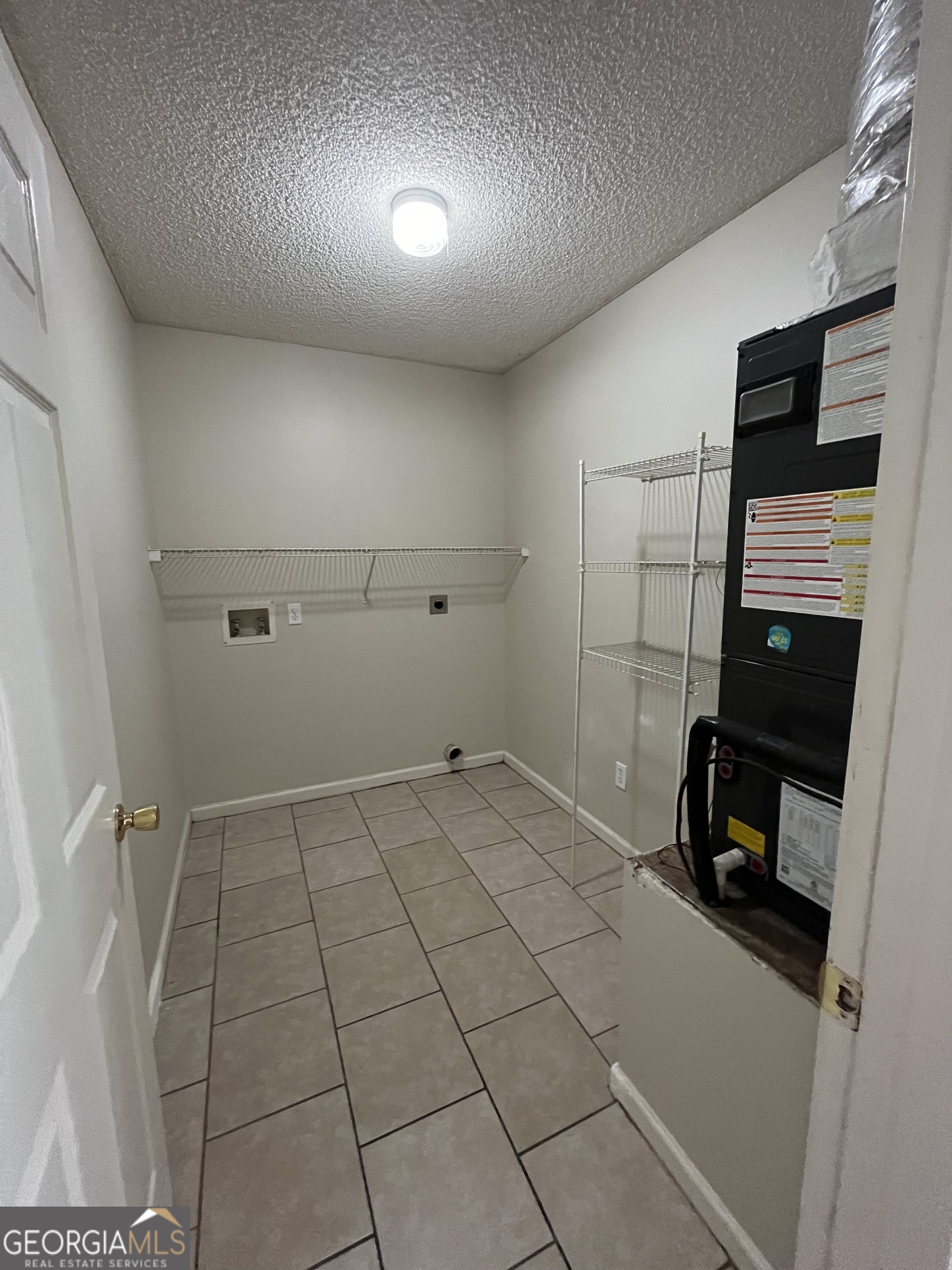 15 Talbot Court St. Marys, GA 31558 - Photo 9 of 20 a view of a storage & utility room