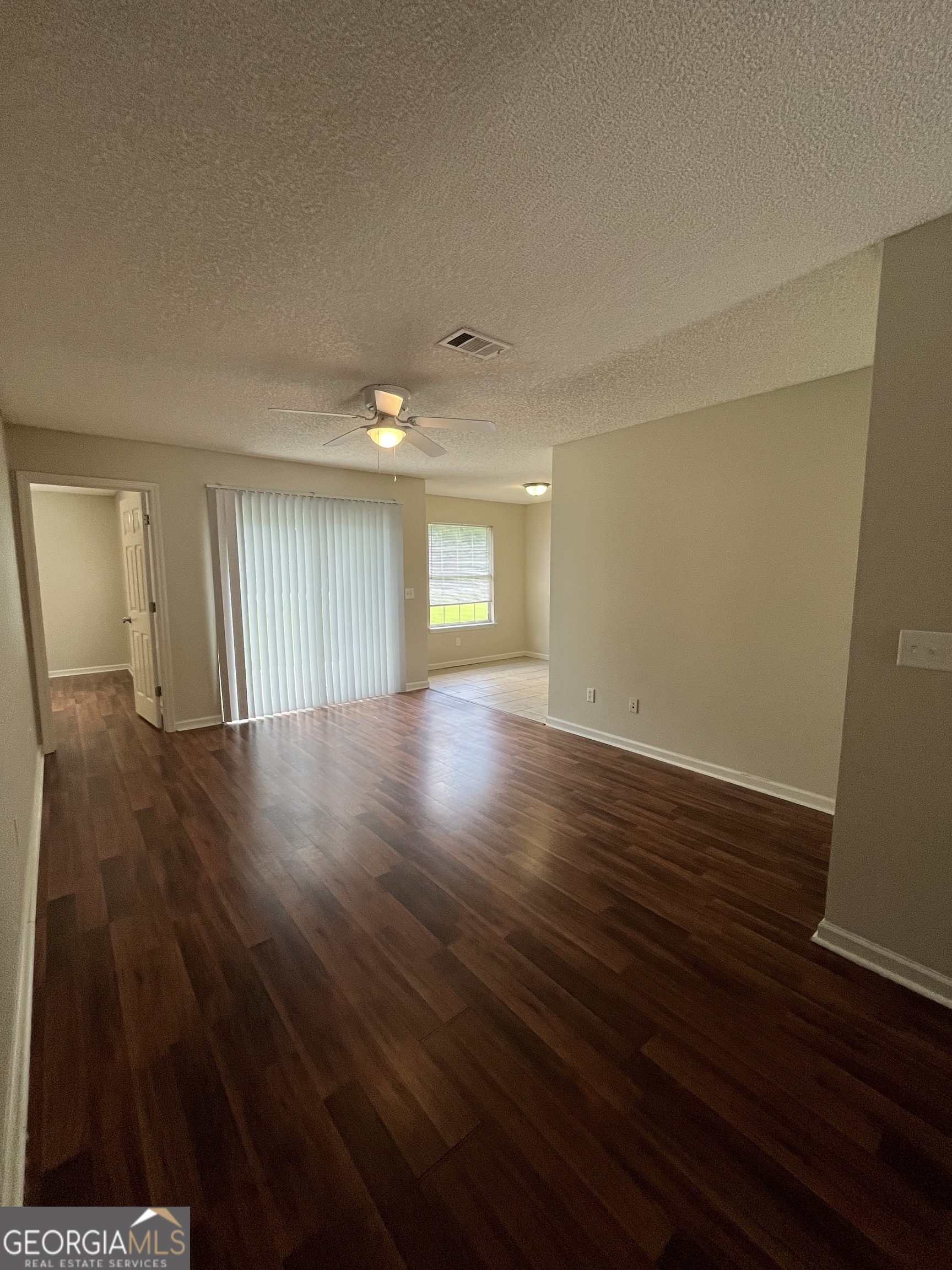 15 Talbot Court St. Marys, GA 31558 - Photo 10 of 20 wooden floor in an empty room with a window