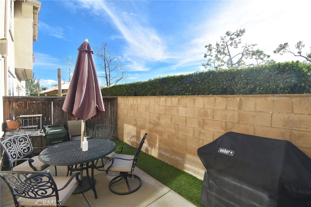 7353 Ellena West, Unit 70 Rancho Cucamonga, CA 91730 - Photo 12 of 40 a view of balcony with furniture and a potted plant