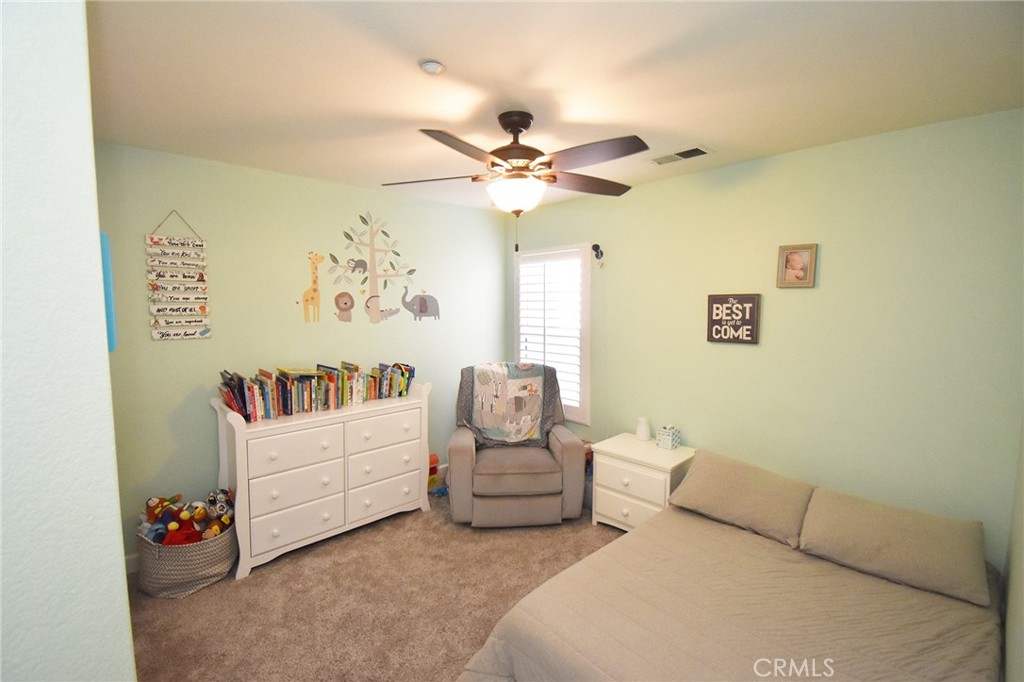 7353 Ellena West, Unit 70 Rancho Cucamonga, CA 91730 - Photo 16 of 40 a living room with furniture