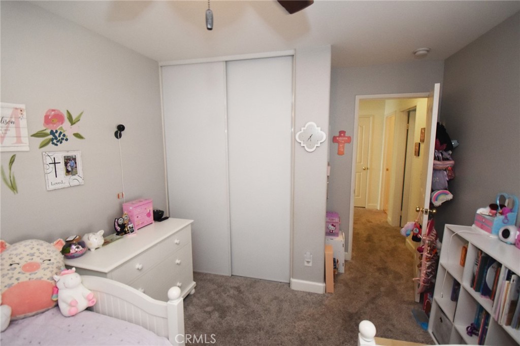 7353 Ellena West, Unit 70 Rancho Cucamonga, CA 91730 - Photo 19 of 40 a room with furniture and wooden floor