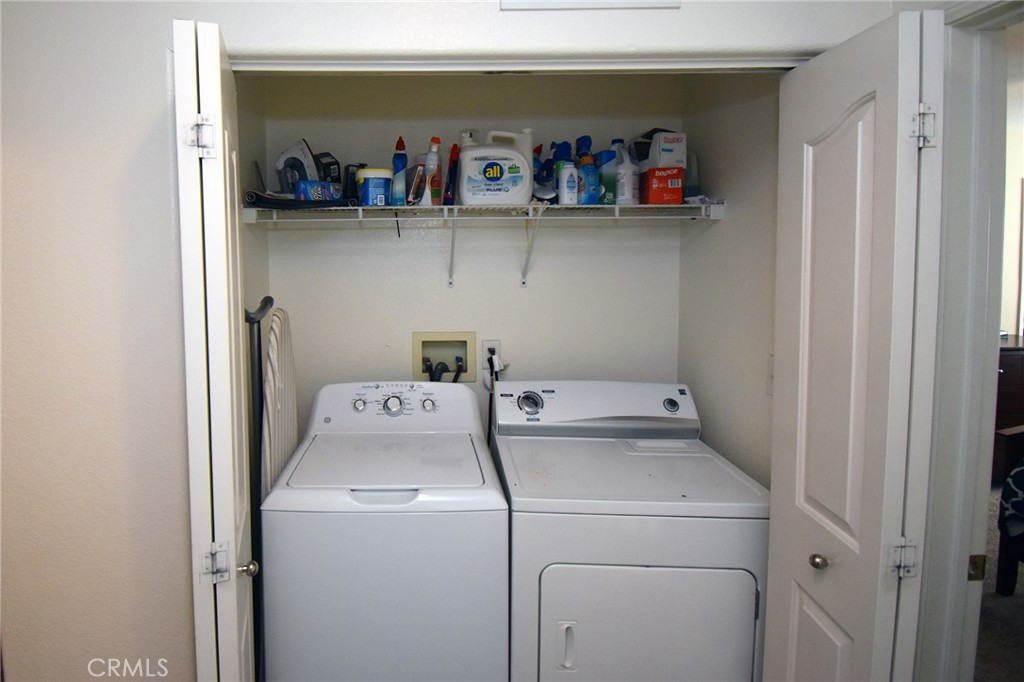 7353 Ellena West, Unit 70 Rancho Cucamonga, CA 91730 - Photo 21 of 40 a utility room with dryer and washer