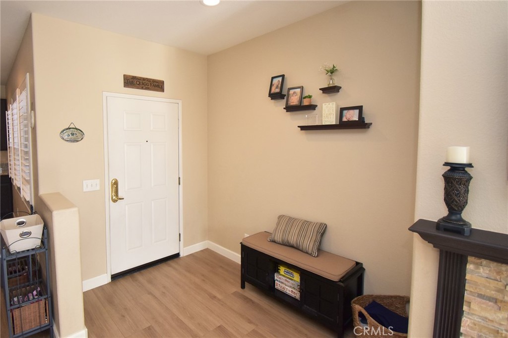 7353 Ellena West, Unit 70 Rancho Cucamonga, CA 91730 - Photo 5 of 40 a room with furniture and wooden floor