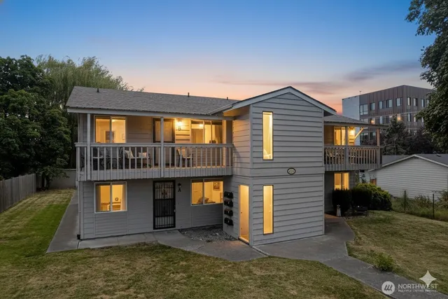a front view of a house with a yard