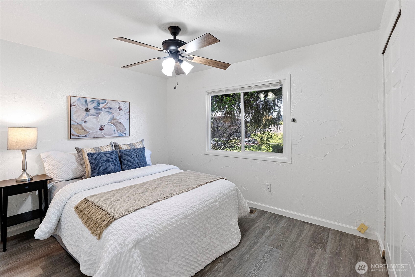 414 Plum Street Bremerton, WA 98310 - Photo 14 of 40 a bedroom with a bed and a painting on the wall