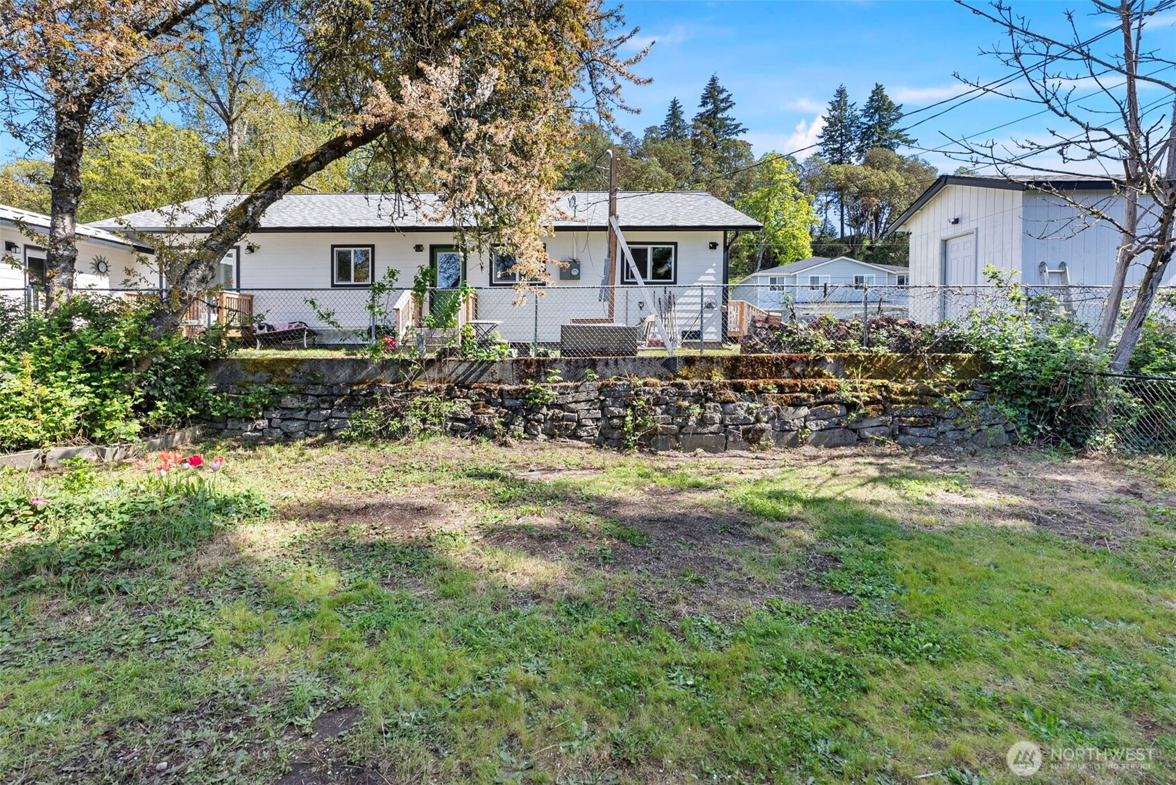 414 Plum Street Bremerton, WA 98310 - Photo 19 of 40 a front view of a house with garden