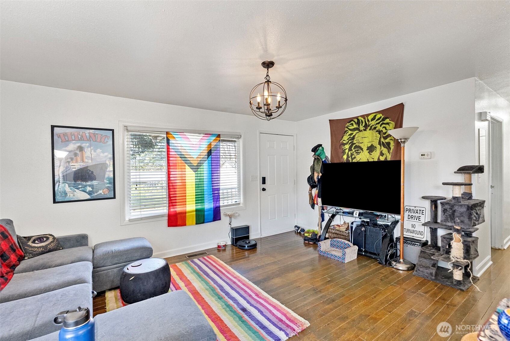414 Plum Street Bremerton, WA 98310 - Photo 22 of 40 a bedroom with furniture and a flat screen tv