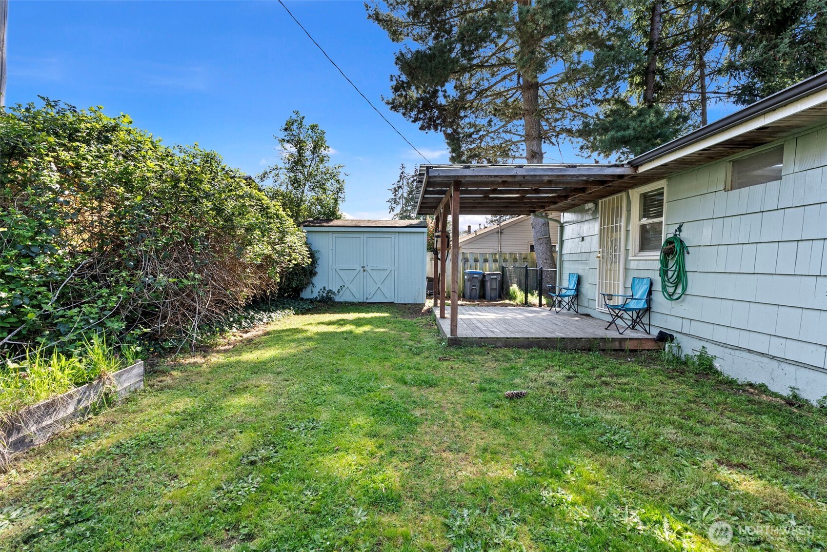 414 Plum Street Bremerton, WA 98310 - Photo 29 of 40 a view of a chair and table in the garden