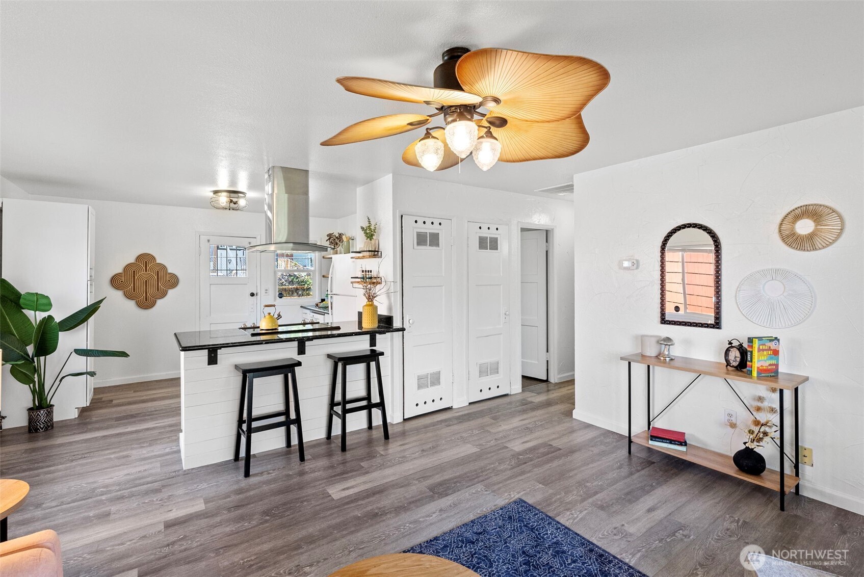414 Plum Street Bremerton, WA 98310 - Photo 7 of 40 a view of a dining room with a table and chairs