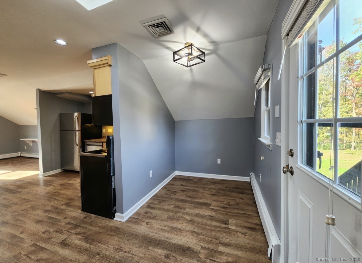 4994 Madison Avenue Trumbull, CT 06611 - Photo 15 of 22 Cozy dining area with picturesque view of backyard
