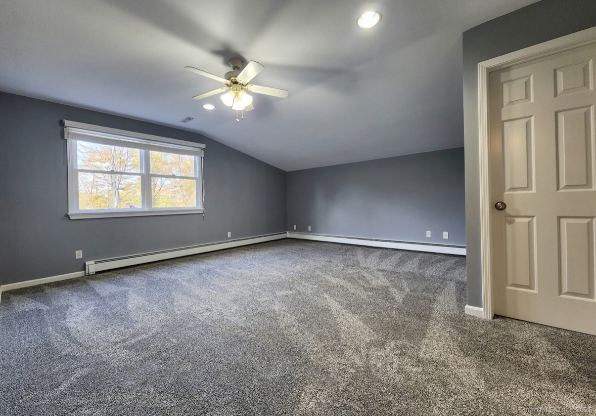4994 Madison Avenue Trumbull, CT 06611 - Photo 20 of 22 Large sunlit, cozy bedroom
