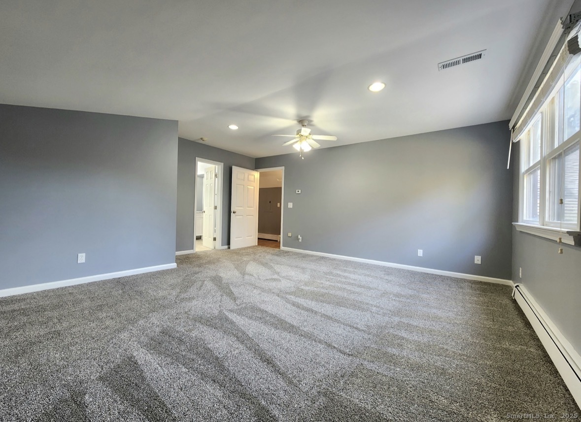 4994 Madison Avenue Trumbull, CT 06611 - Photo 3 of 22 Cozy, sunlit bedroom