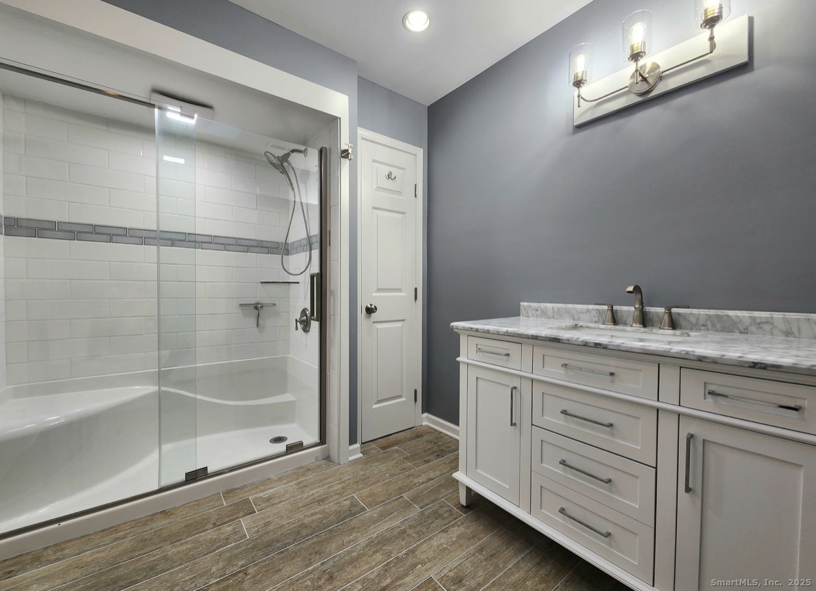 4994 Madison Avenue Trumbull, CT 06611 - Photo 5 of 22 Modern, refreshed bathroom