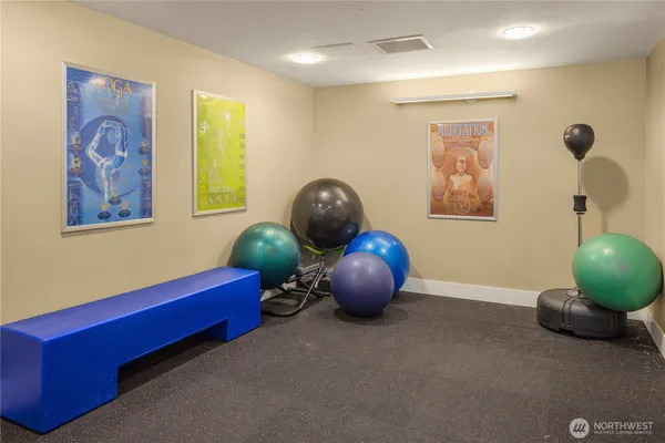 a room with furniture and wall painting