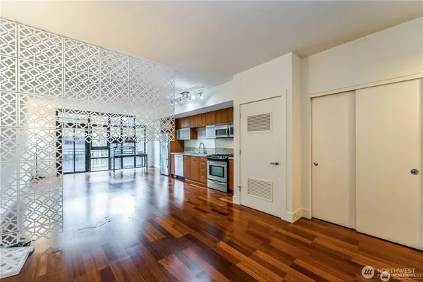a view of a livingroom with wooden floor