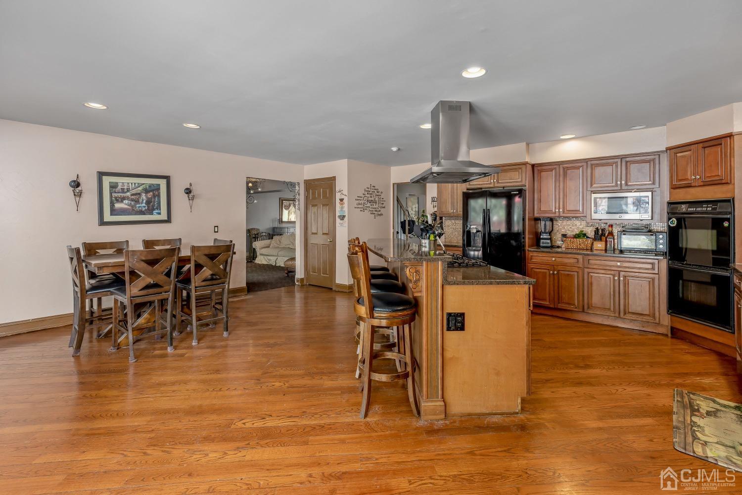 116 Bar Harbor Road Freehold, NJ 07728 - Photo 9 of 30 a view of a dining room with furniture