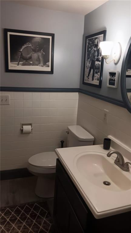 206 8th Avenue Butler, PA 16001 - Photo 15 of 20 a bathroom with a toilet sink and mirror