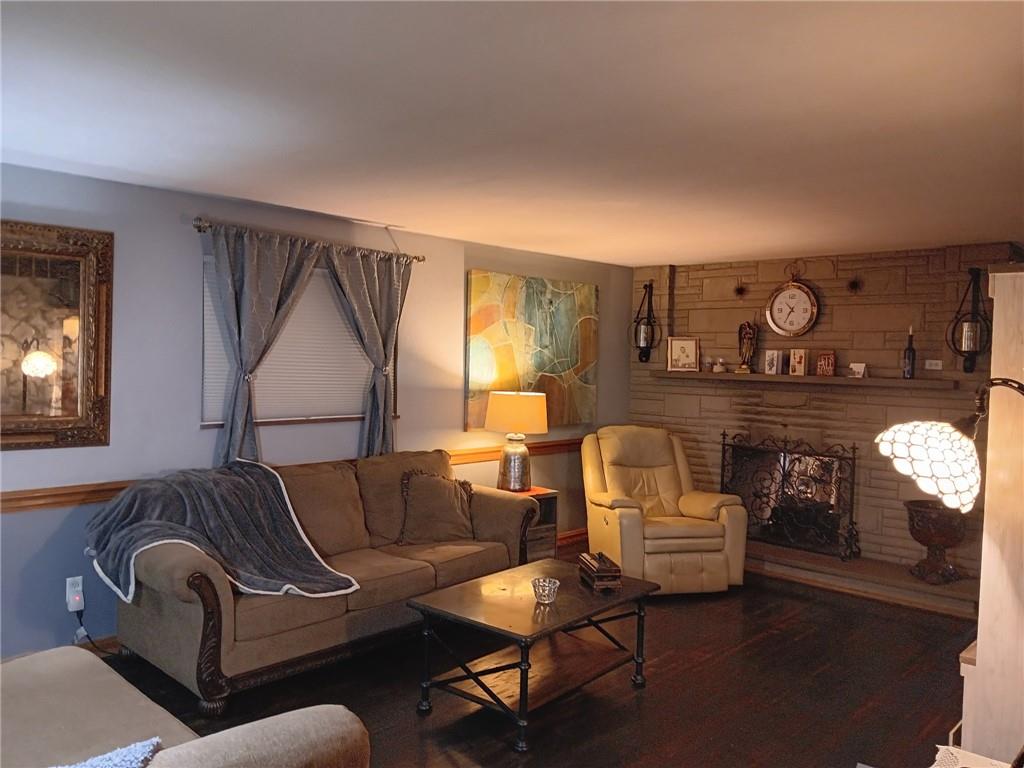 206 8th Avenue Butler, PA 16001 - Photo 5 of 20 a living room with furniture and a fireplace