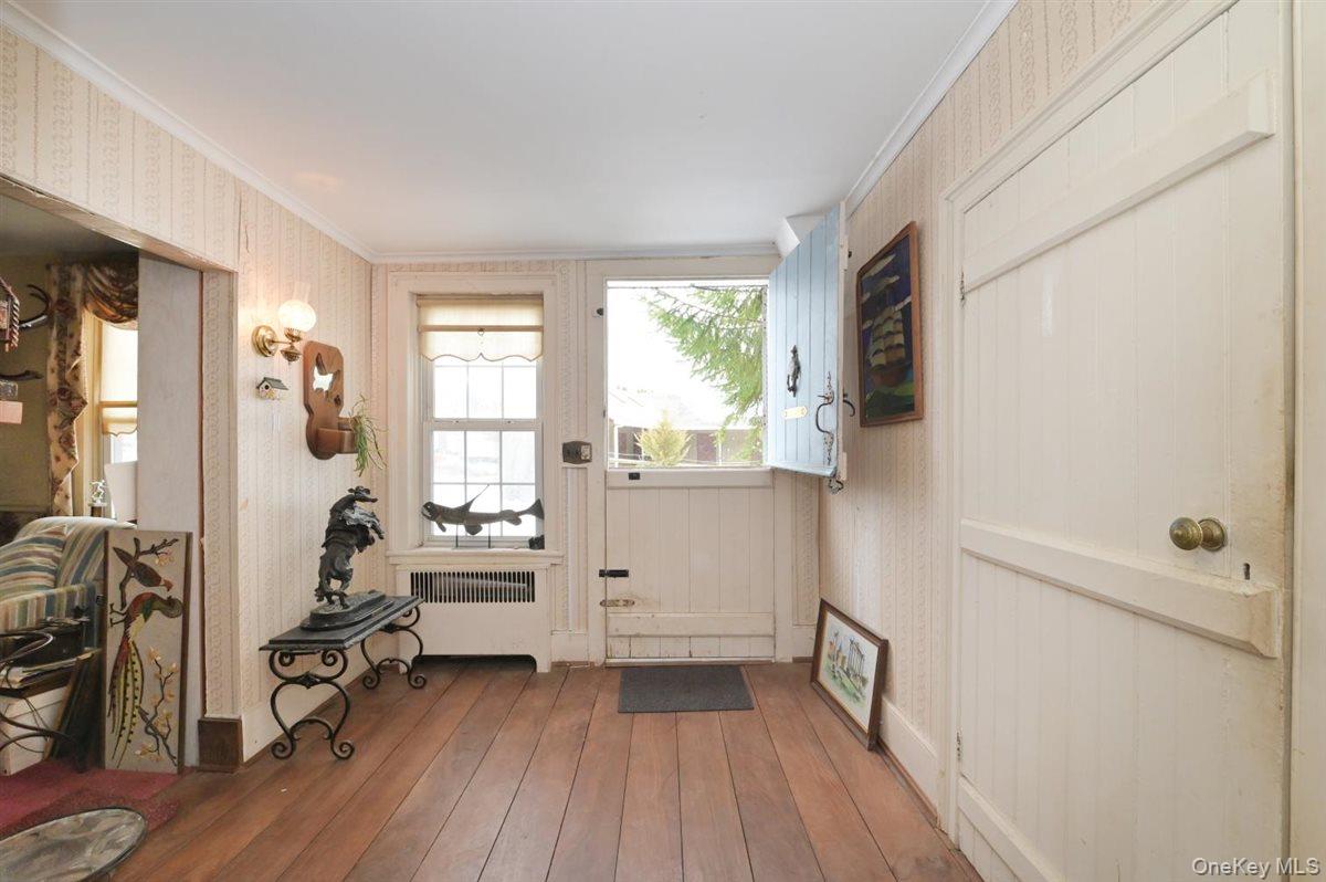 6 Callahan Road Fort Salonga, NY 11768 - Photo 17 of 50 a view of a room with wooden floor and furniture
