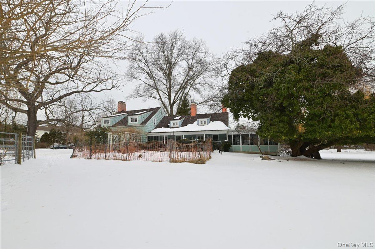 6 Callahan Road Fort Salonga, NY 11768 - Photo 2 of 50 a view of a snow with a yard covered with snow in front of house