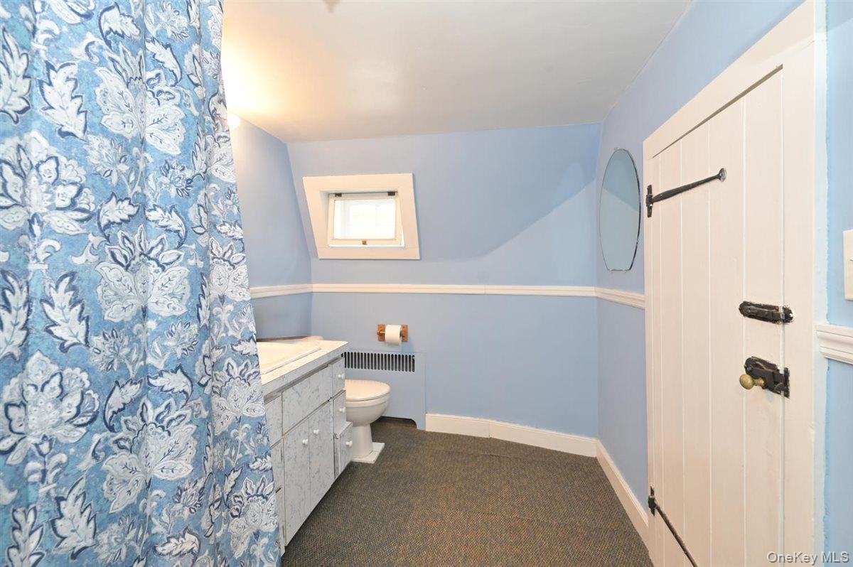 6 Callahan Road Fort Salonga, NY 11768 - Photo 24 of 50 a bathroom with a sink toilet and shower