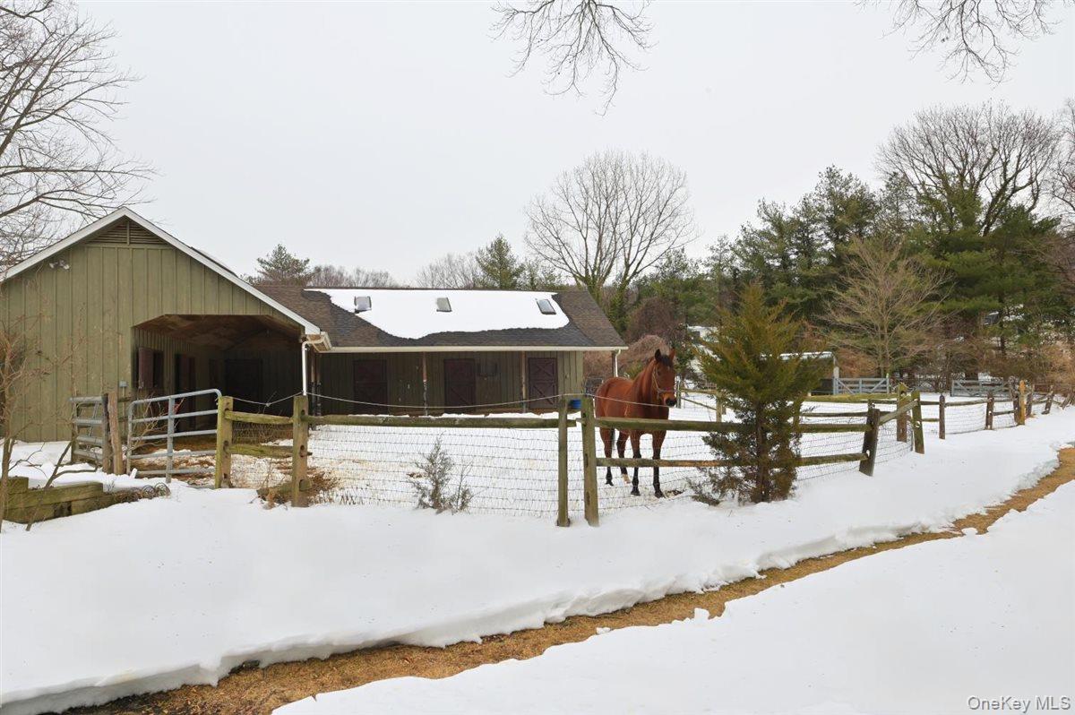 6 Callahan Road Fort Salonga, NY 11768 - Photo 29 of 50 a view of a house with snow on the road