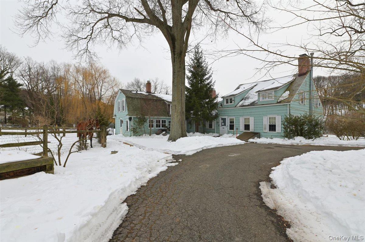 6 Callahan Road Fort Salonga, NY 11768 - Photo 3 of 50 a view of a house with snow on the road