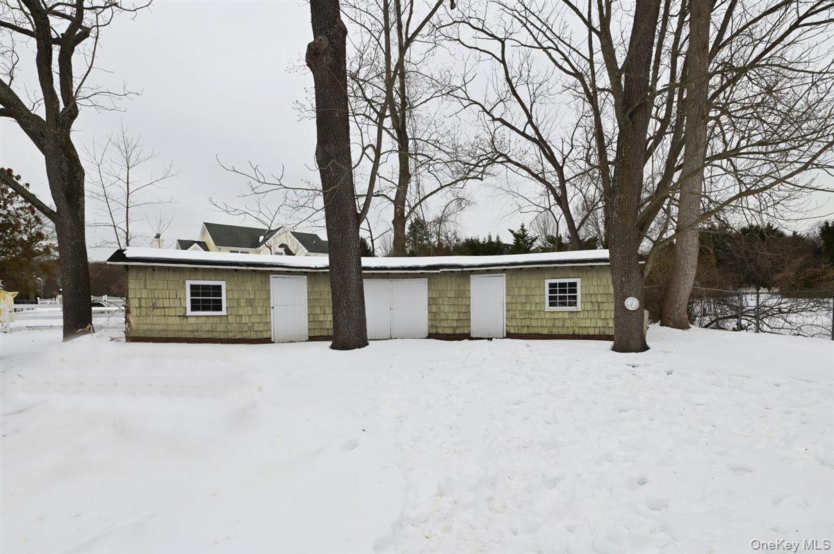 6 Callahan Road Fort Salonga, NY 11768 - Photo 33 of 50 a house that has a tree in front of it
