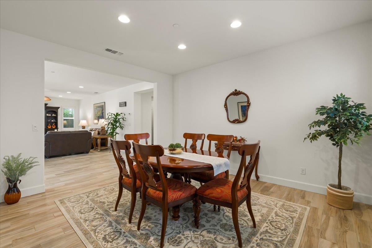 1188 Viognier Way Gilroy, CA 95020 - Photo 11 of 71 a view of a dining room with furniture