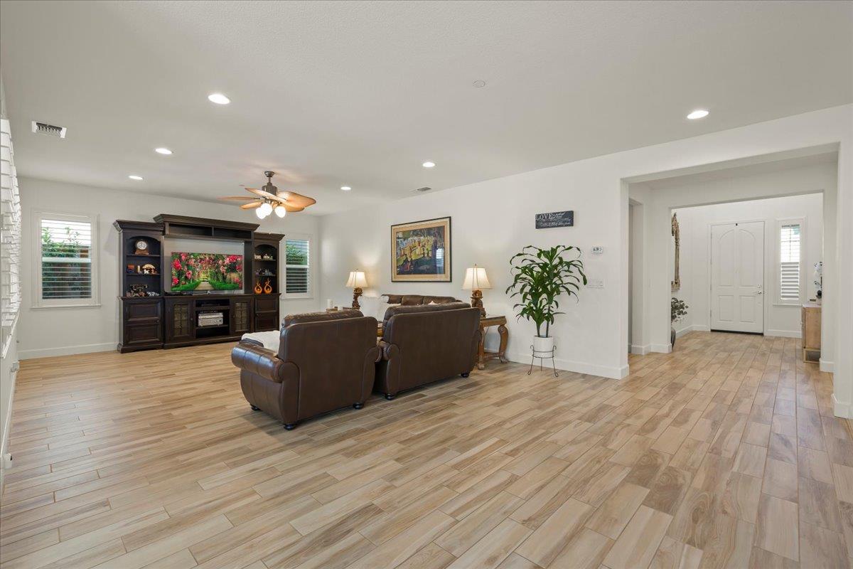 1188 Viognier Way Gilroy, CA 95020 - Photo 16 of 71 a living room with furniture and a flat screen tv