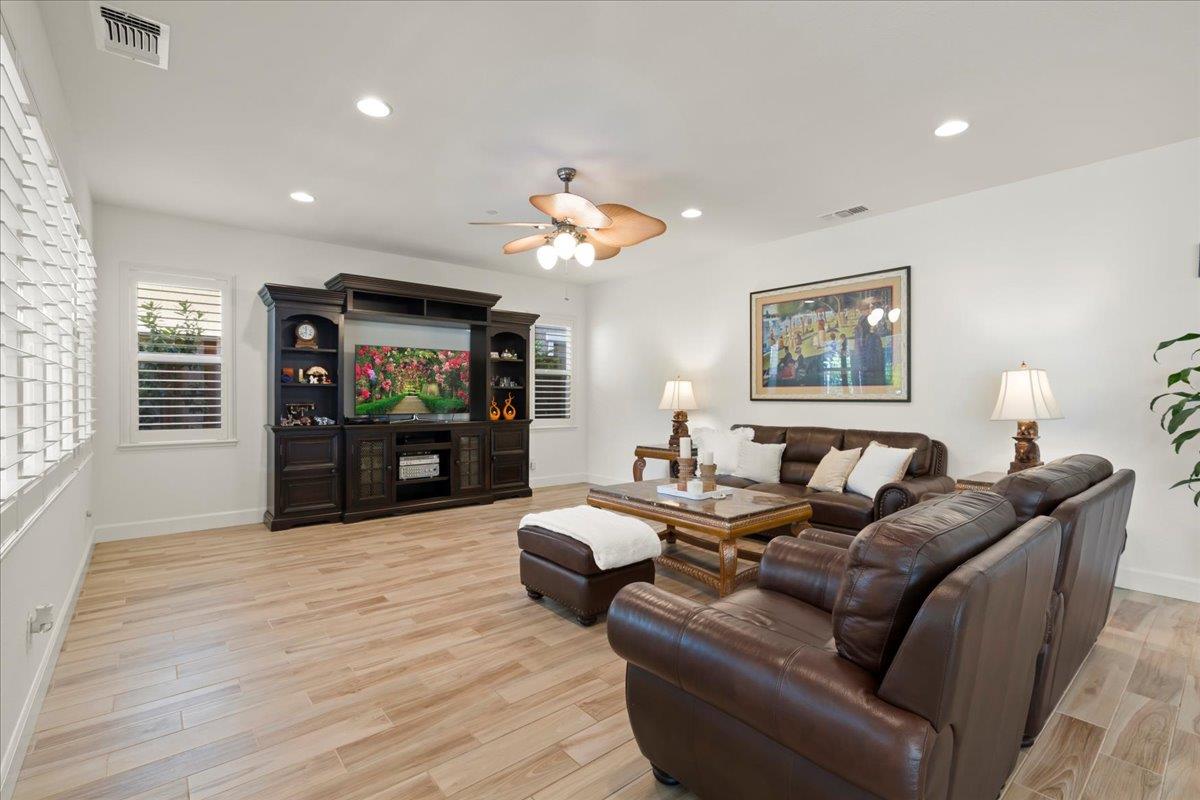 1188 Viognier Way Gilroy, CA 95020 - Photo 17 of 71 a living room with furniture and a flat screen tv
