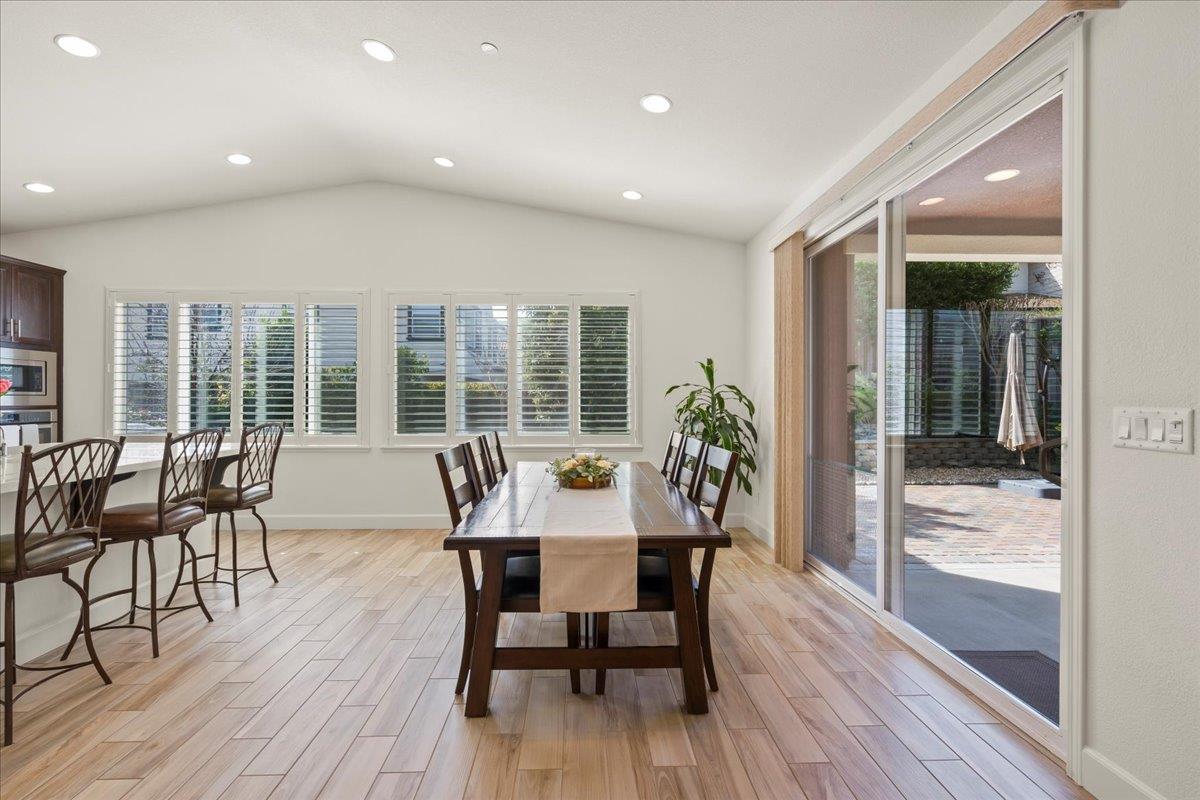 1188 Viognier Way Gilroy, CA 95020 - Photo 19 of 71 a view of a dining room with furniture and wooden floor
